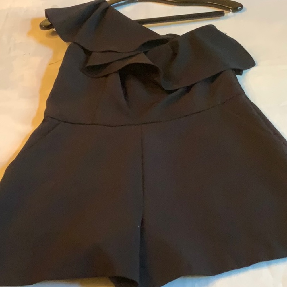 Woman’s one shoulder Aqua black romper size M